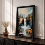 This impasto style framed canvas features a waterfall cascading between rocky cliffs surrounded by dense forest and mist, with textured brushstrokes creating a vivid landscape scene of nature’s power and tranquility.