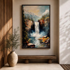 This impasto style framed canvas features a waterfall cascading between rocky cliffs surrounded by dense forest and mist, with textured brushstrokes creating a vivid landscape scene of nature’s power and tranquility.