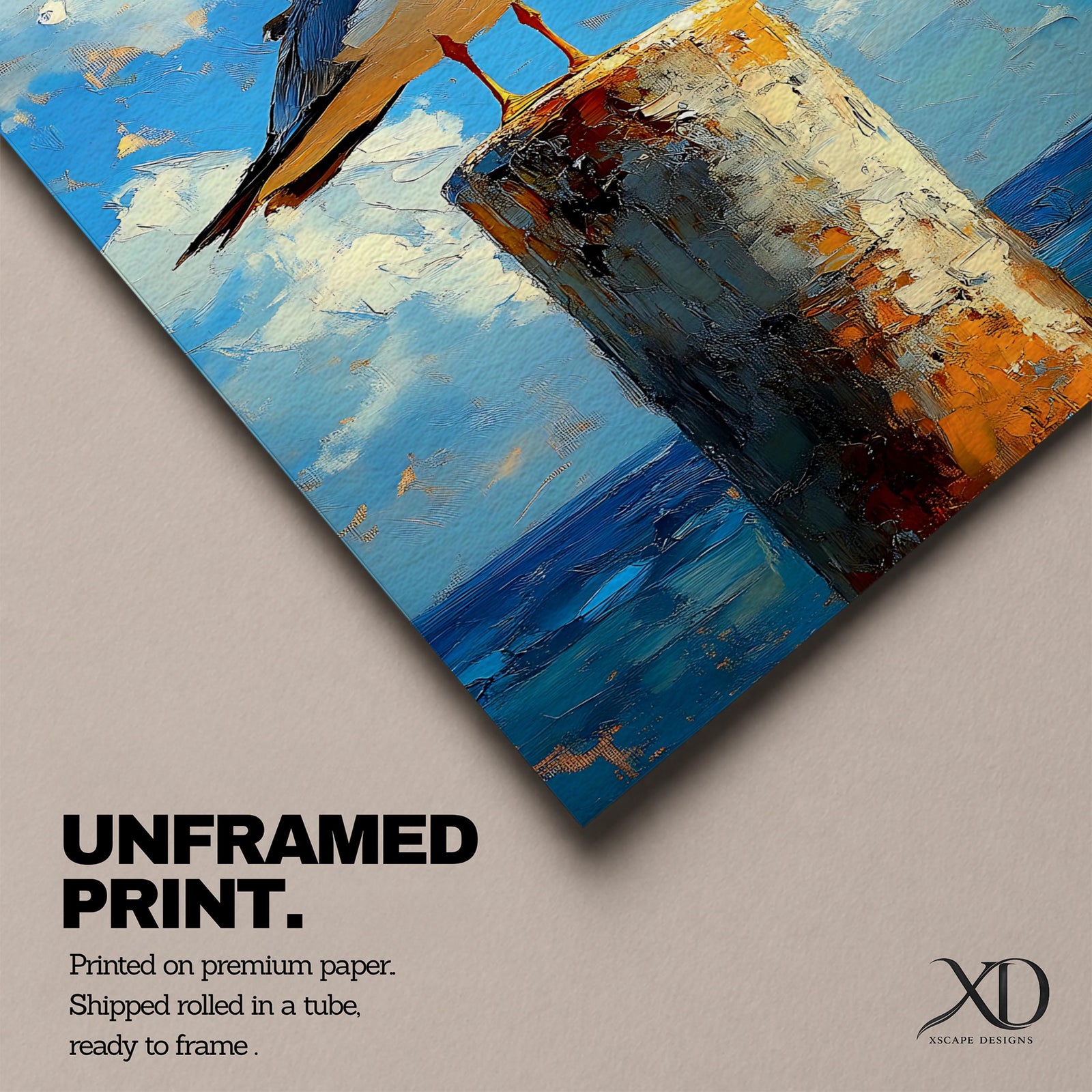A framed canvas painting of a seagull perched on a weathered post against a bright blue sky with fluffy clouds and a distant ocean horizon. The artwork captures the bird in a realistic style with textured brushstrokes emphasizing the natural coastal scene.