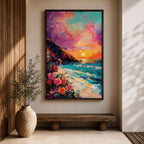 An impasto style framed canvas depicting a vibrant beach sunset with colorful sky, waves crashing on the shore, and blooming flowers in the foreground, capturing a coastal seascape landscape scene with textured brushstrokes and bold colors.