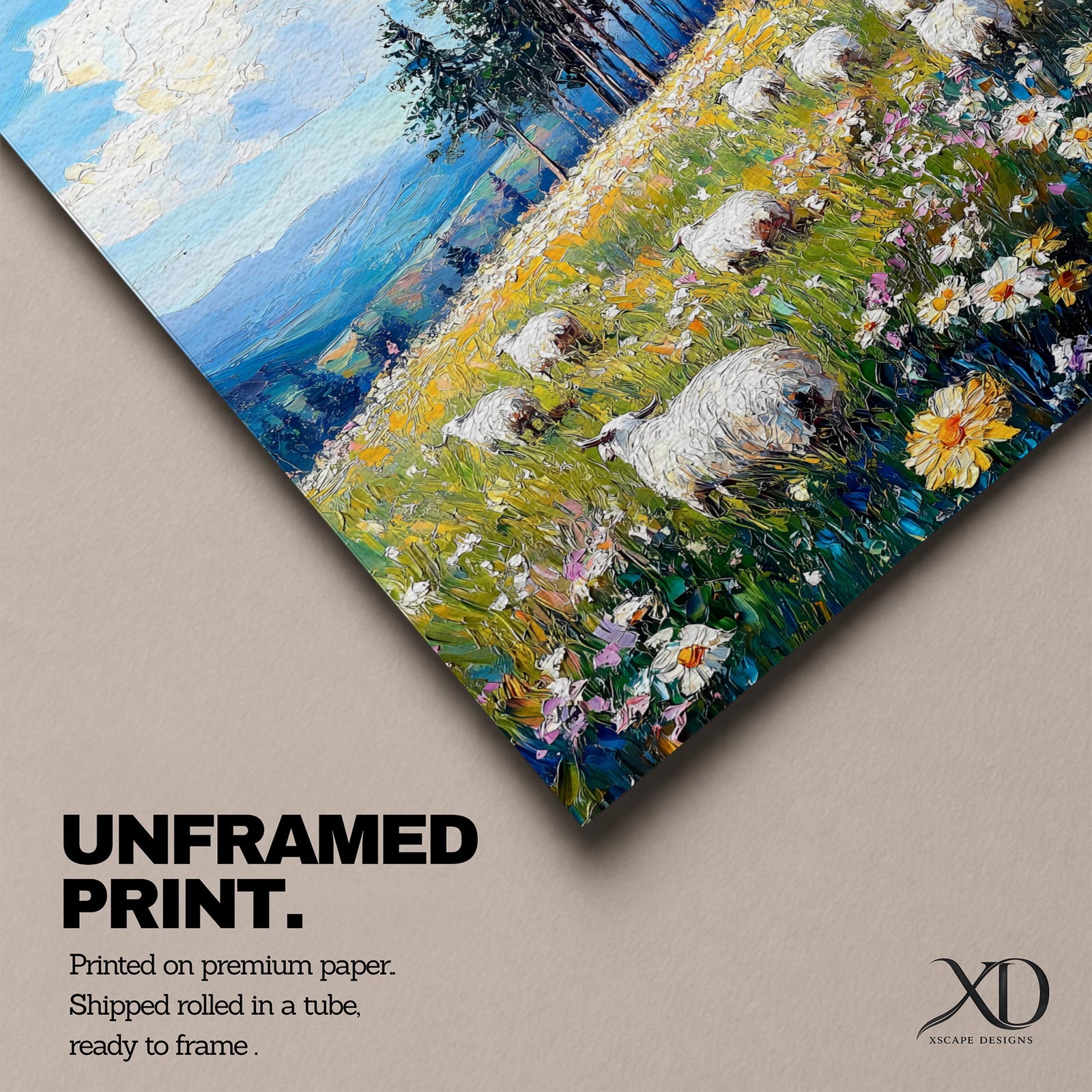 This impasto style framed canvas depicts a scenic landscape of sheep grazing in a meadow filled with wildflowers, bordered by tall trees and distant mountains under a bright blue sky with fluffy clouds, rendered with thick textured brushstrokes that emphasize the natural rustic setting.