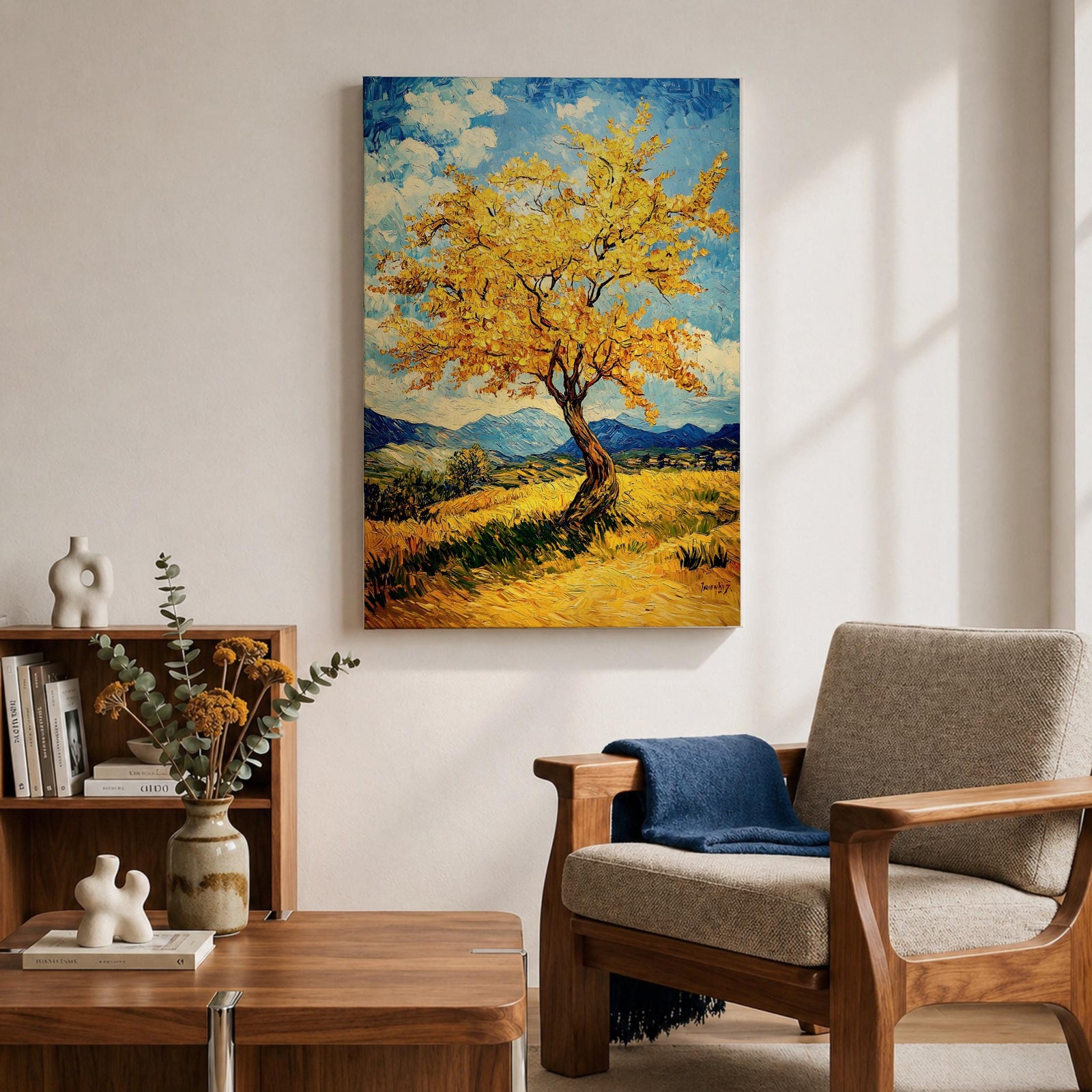 An impasto style painting of a golden tree with vibrant yellow leaves standing alone in a rustic landscape with rolling hills and distant mountains under a partly cloudy blue sky. The textured brushstrokes create a rich, tactile effect emphasizing the natural beauty of the tree and countryside.