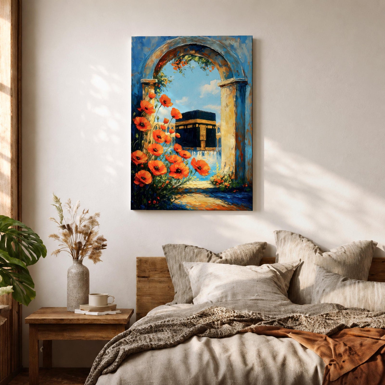 A vibrant painting depicting the Kaaba framed by an ancient stone arch adorned with bright orange flowers. The artwork captures the iconic Islamic holy site with a clear blue sky background, rendered in a realistic style emphasizing architectural and floral details.