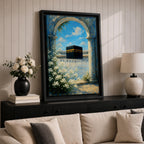 A watercolor painting depicting the Kaaba framed by a floral arch with white blossoms and stone columns, set against a bright blue sky with soft clouds, capturing the iconic Islamic holy site in Mecca with delicate brushwork and vibrant colors.