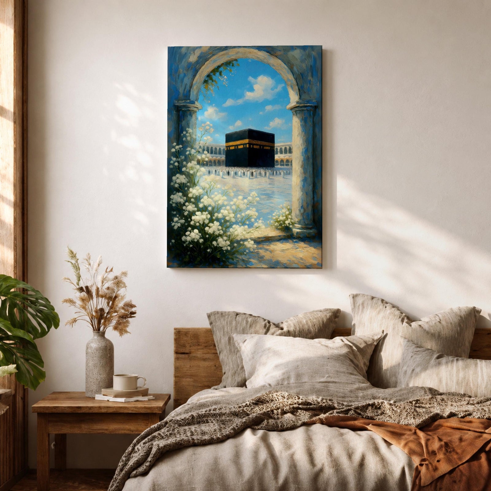 A watercolor painting depicting the Kaaba framed by a floral arch with white blossoms and stone columns, set against a bright blue sky with soft clouds, capturing the iconic Islamic holy site in Mecca with delicate brushwork and vibrant colors.