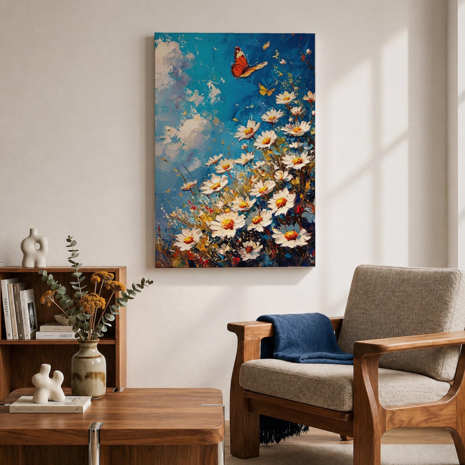 This impasto style framed canvas features a vibrant monarch butterfly fluttering above a cluster of white daisies with yellow centers against a textured blue sky background. The thick brushstrokes create a rich, textured floral composition emphasizing natural beauty and butterfly life in a lively garden scene.