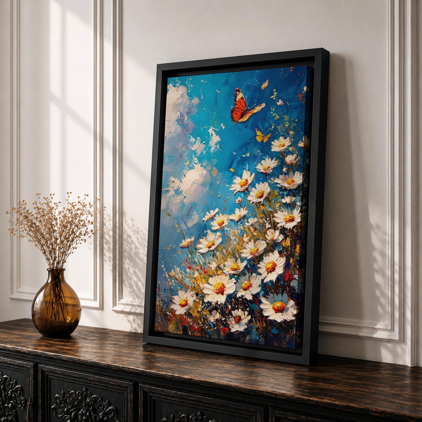 This impasto style framed canvas features a vibrant monarch butterfly fluttering above a cluster of white daisies with yellow centers against a textured blue sky background. The thick brushstrokes create a rich, textured floral composition emphasizing natural beauty and butterfly life in a lively garden scene.