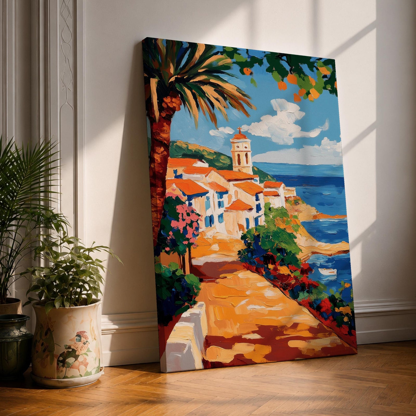 A vibrant Mediterranean coastal scene painted in bold brushstrokes depicts a charming beach house with terracotta roofs beside the deep blue ocean under a bright sky with scattered clouds. Lush greenery and colorful flowers frame the pathway leading to the water, rendered in a lively impressionistic style.