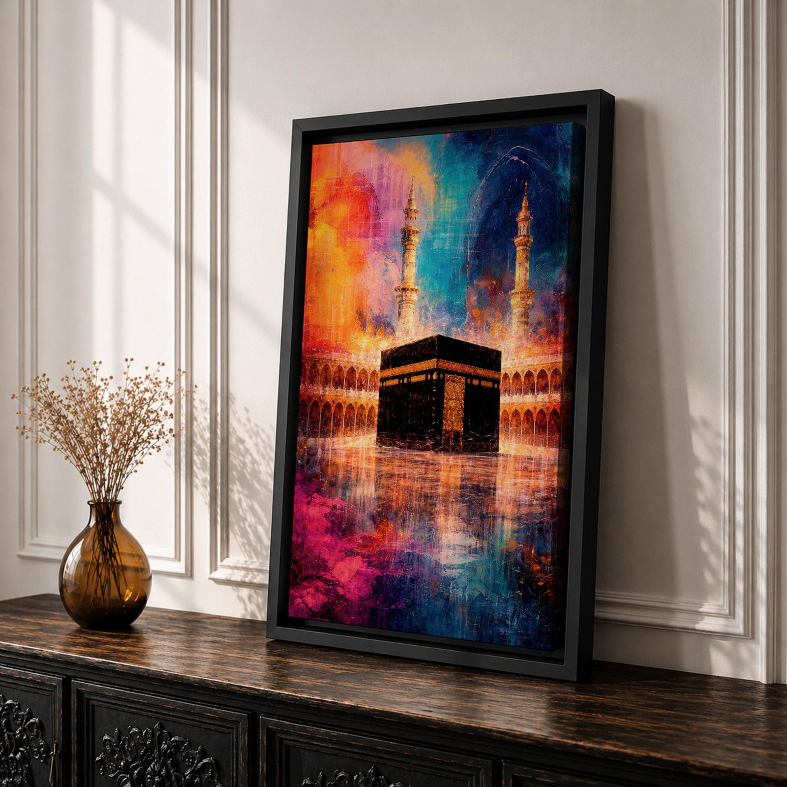 Abstract painting of the Kaaba centered in the Masjid al Haram courtyard with tall mosque minarets rising behind the sacred cube, reflected across the polished ground surface while expressive colorful textures fill the sky, blending recognizable Mecca mosque architecture with modern abstract composition.