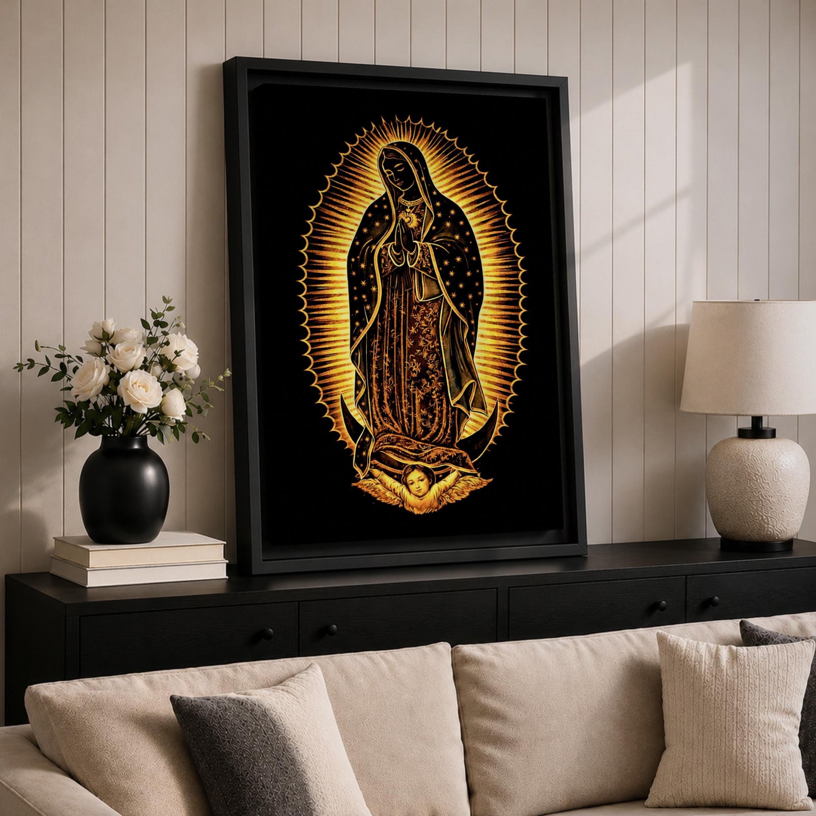 Our Lady of Guadalupe devotional icon showing the Virgin Mary standing in prayer with hands clasped, surrounded by radiant rays and wearing a mantle decorated with stars, positioned above a crescent moon supported by an angel below, following the traditional Catholic Guadalupe apparition imagery used in religious devotional artwork.