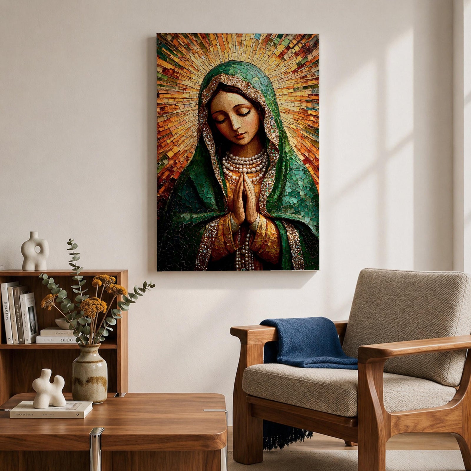 Mosaic style portrait of the Virgin Mary shown with head bowed and hands clasped in prayer, composed of small tile like fragments forming a devotional Catholic image. Radiant rays expand behind her while a detailed veil and necklace are rendered in textured mosaic pieces typical of religious icon artwork.