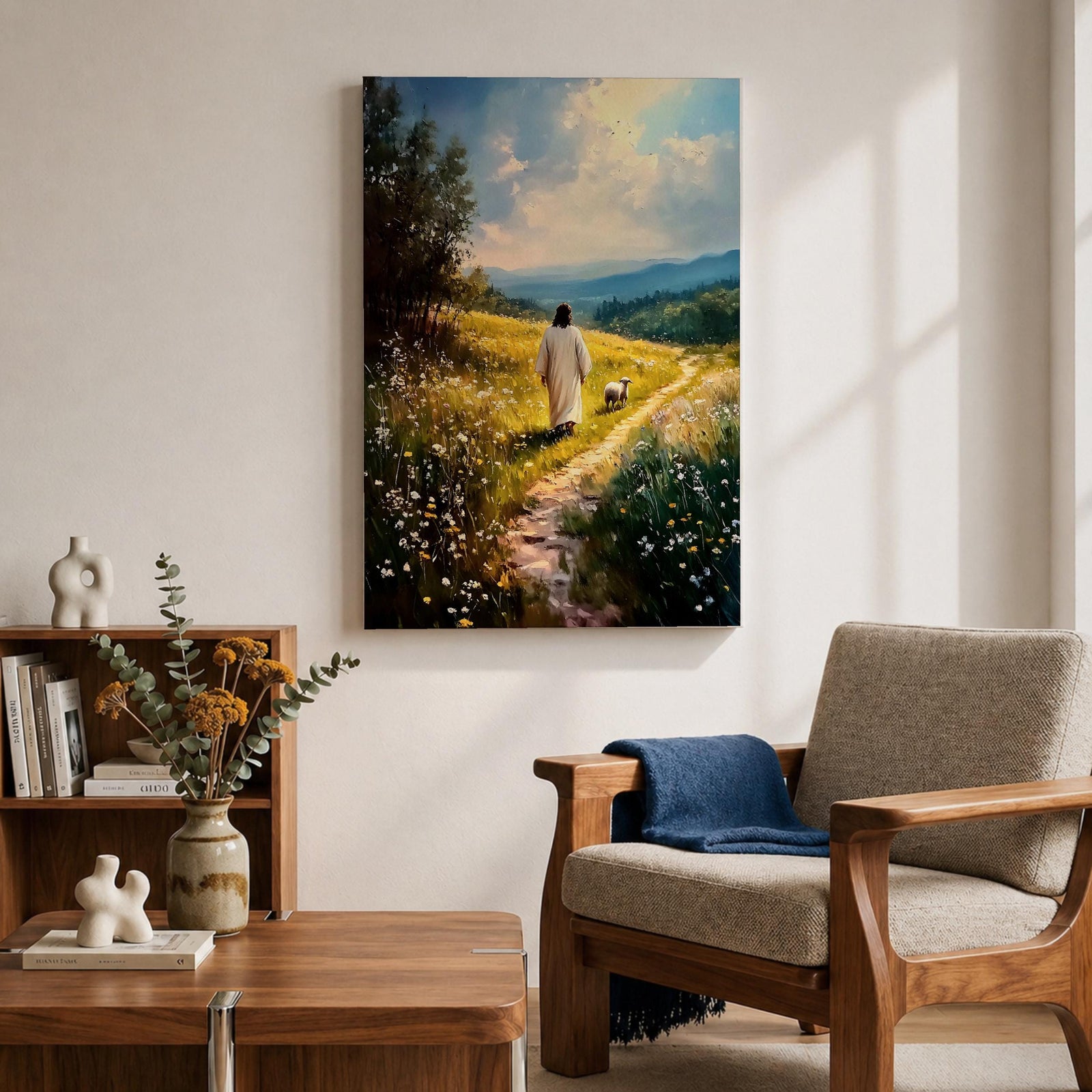 Painting of Jesus walking along a winding path through a sunlit meadow filled with wildflowers while a small lamb walks beside him, with rolling hills and soft clouds in the distance, rendered in a pastoral Christian style that reflects the biblical Good Shepherd and lost lamb theme.