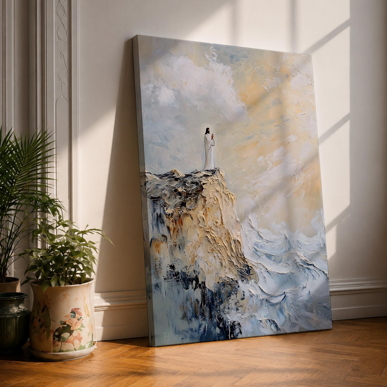 Impasto style painting of Jesus standing in prayer on the edge of a rocky seaside cliff, wearing a flowing white robe while waves crash below and soft light breaks through the clouds above, rendered with thick textured brushstrokes and a minimalist composition emphasizing a quiet devotional moment of Christ in prayer.