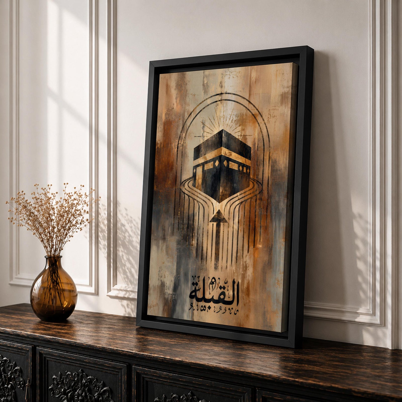 Minimalist Islamic artwork depicting the Kaaba with geometric directional lines guiding toward it to represent the Qibla prayer direction, with Arabic calligraphy reading Al-Qibla beneath the design.