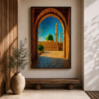 Artwork of Masjid Al Nabawi in Medina viewed through a historic stone archway with the iconic green dome and tall mosque minarets rising under a bright blue sky.