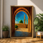 Artwork of Masjid Al Nabawi in Medina viewed through a historic stone archway with the iconic green dome and tall mosque minarets rising under a bright blue sky.