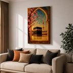 Textured oil painting of the Kaaba in Masjid Haram framed by a decorative Islamic archway with blooming pink flowers, a mosque minaret in the background, and warm sunset tones over the courtyard.