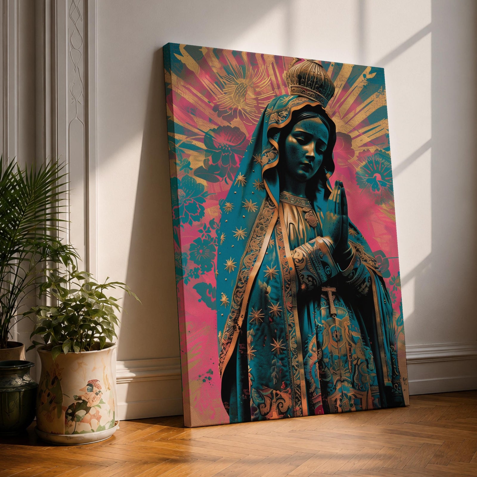 Retro style illustration of the Virgin Mary with hands folded in prayer, wearing a decorated blue mantle with star patterns and a crown, surrounded by radiant rays and floral graphic elements in bold pink and teal colors, rendered in a modern pop inspired Madonna composition with ornamental details.