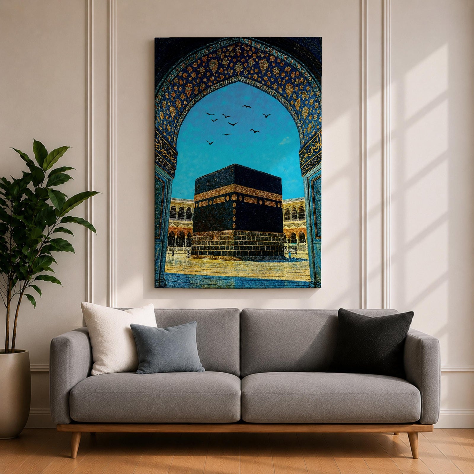 Artwork of the Kaaba in Masjid Haram framed by an ornate Moorish arabesque archway with intricate blue and gold patterns and birds flying across a bright sky above the mosque courtyard.