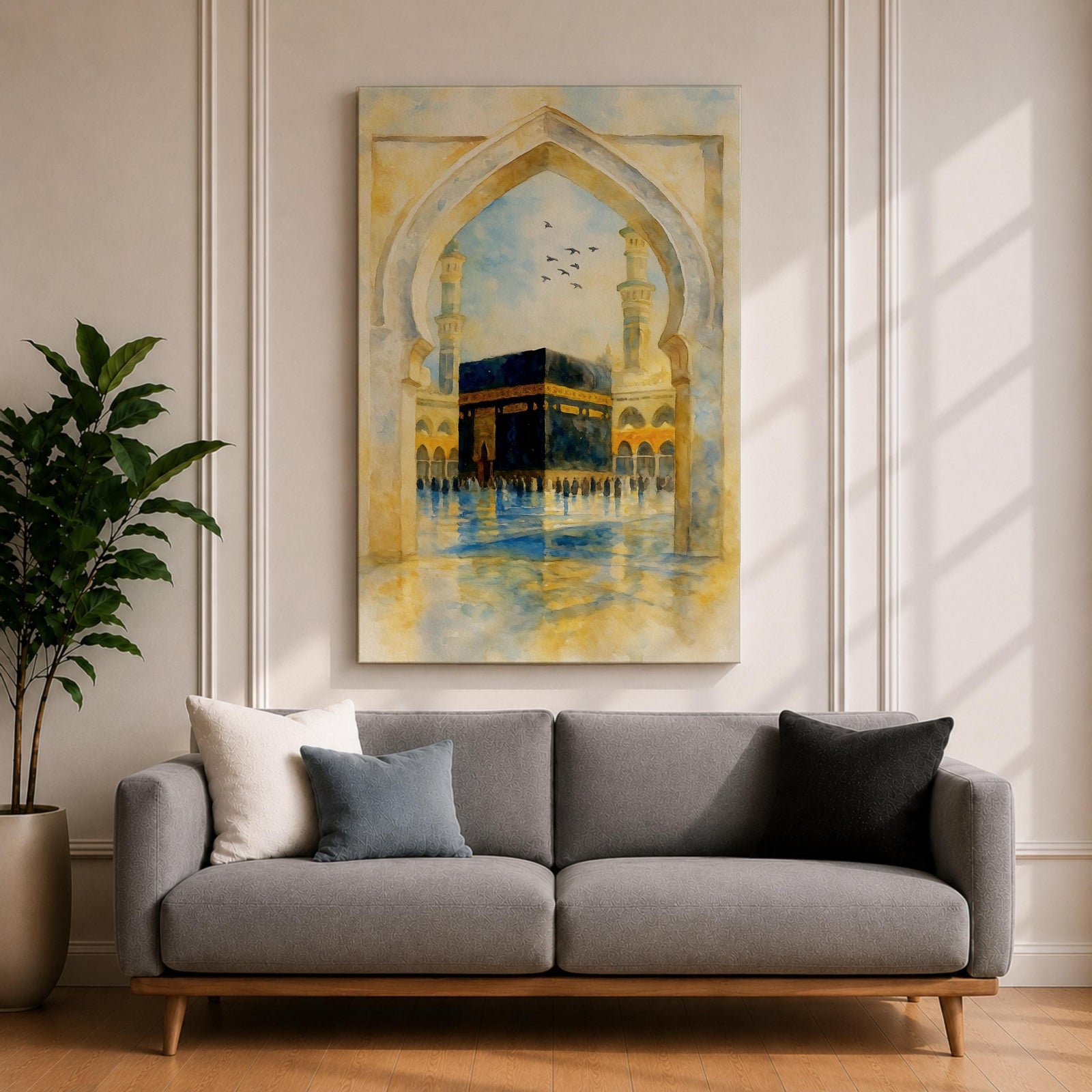 Soft watercolor artwork of the Kaaba at Masjid Al Haram framed by a Moorish pointed arch with mosque minarets and birds flying above the reflective courtyard.