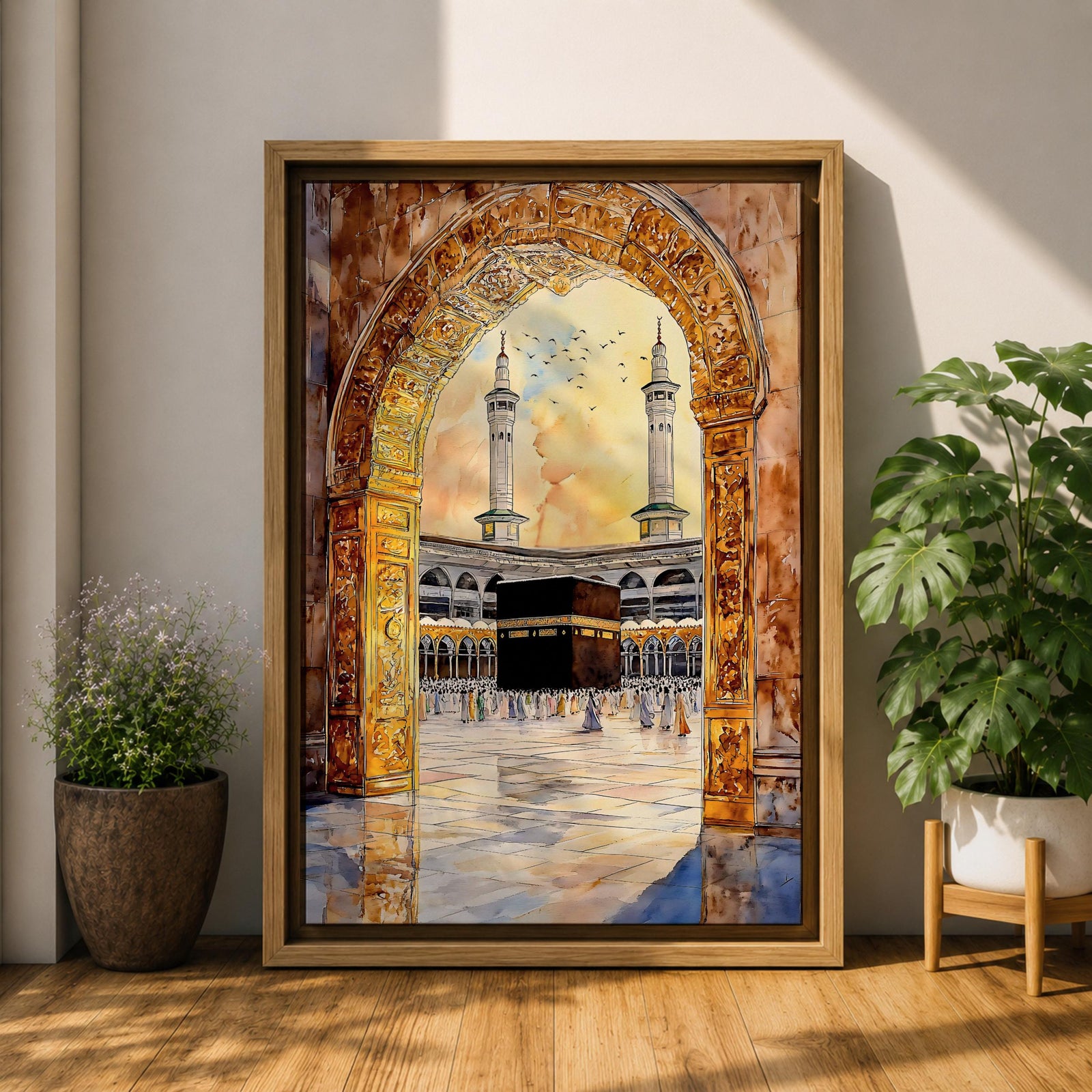 Watercolor artwork of the Kaaba in Masjid Haram viewed through an ornate mosque archway with twin minarets rising above the courtyard and pilgrims gathered around the sacred sanctuary.