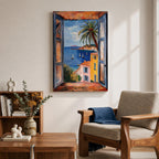 A framed canvas artwork depicting a coastal window view overlooking a Mediterranean ocean scene with sailboats on blue water, colorful buildings with terracotta roofs, and a palm tree, rendered in a realistic style capturing the serene seaside landscape.