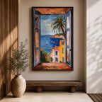A framed canvas artwork depicting a coastal window view overlooking a Mediterranean ocean scene with sailboats on blue water, colorful buildings with terracotta roofs, and a palm tree, rendered in a realistic style capturing the serene seaside landscape.