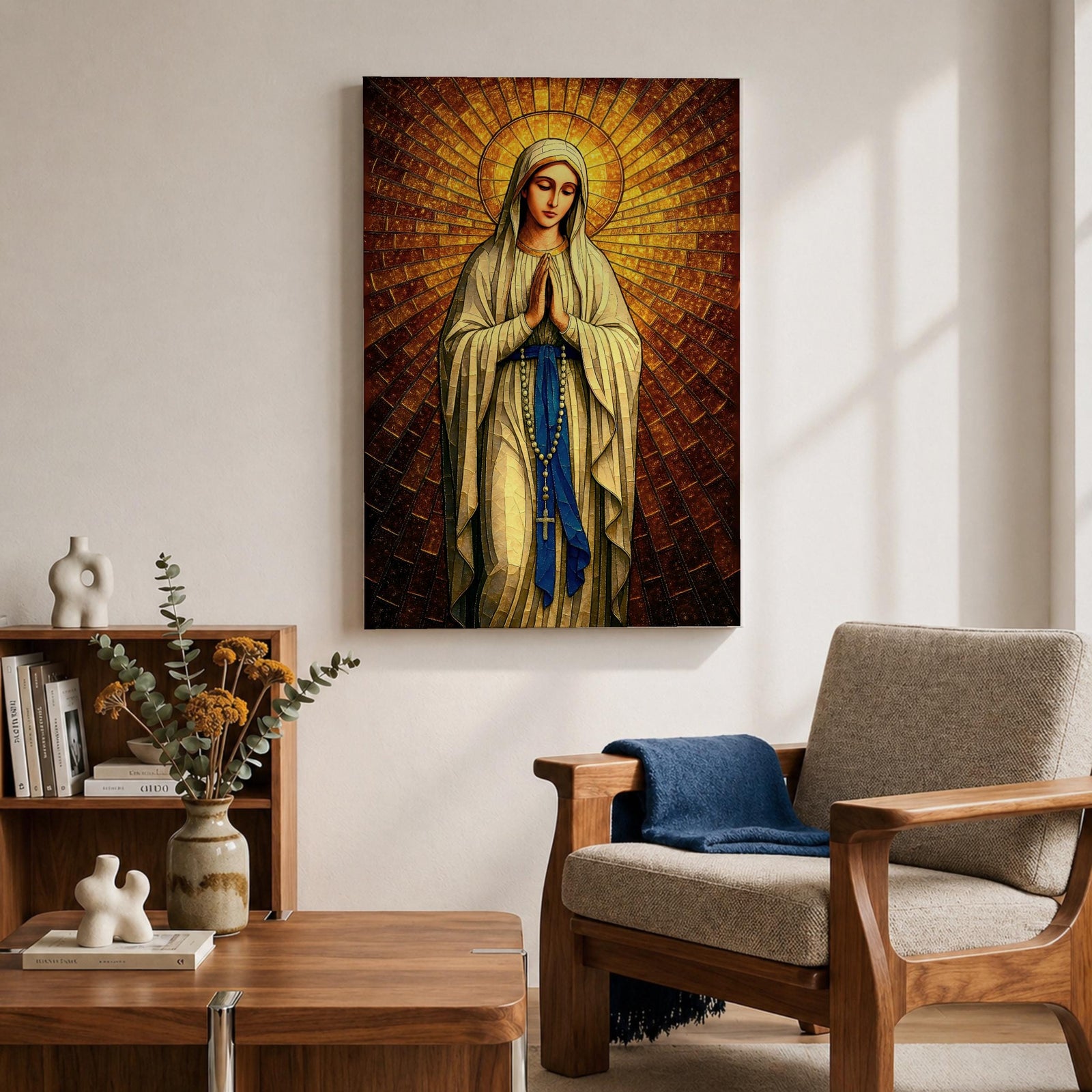A stained glass style artwork depicting Our Lady of Fatima standing with hands clasped in prayer, wearing a flowing robe and a blue sash with rosary beads. The background features radiant golden mosaic tiles arranged in a halo pattern emphasizing the figure’s serene expression and sacred presence.
