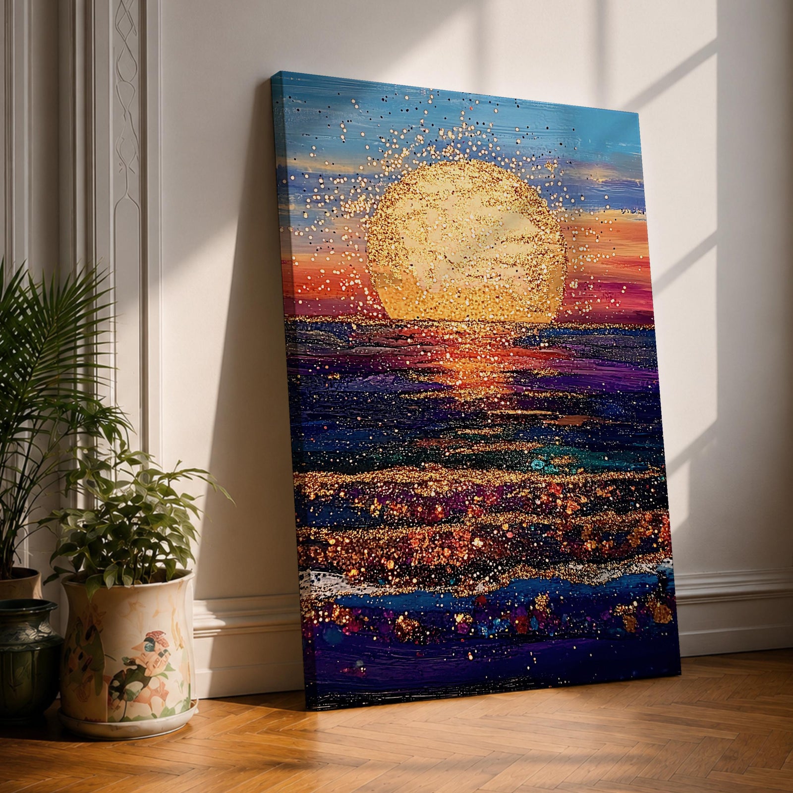 A vibrant painting of a large golden sun setting over a textured ocean horizon, featuring shimmering reflections on the water and a colorful sky blending blues, purples, and warm sunset tones. The artwork captures a peaceful coastal landscape with a focus on light and natural beauty.