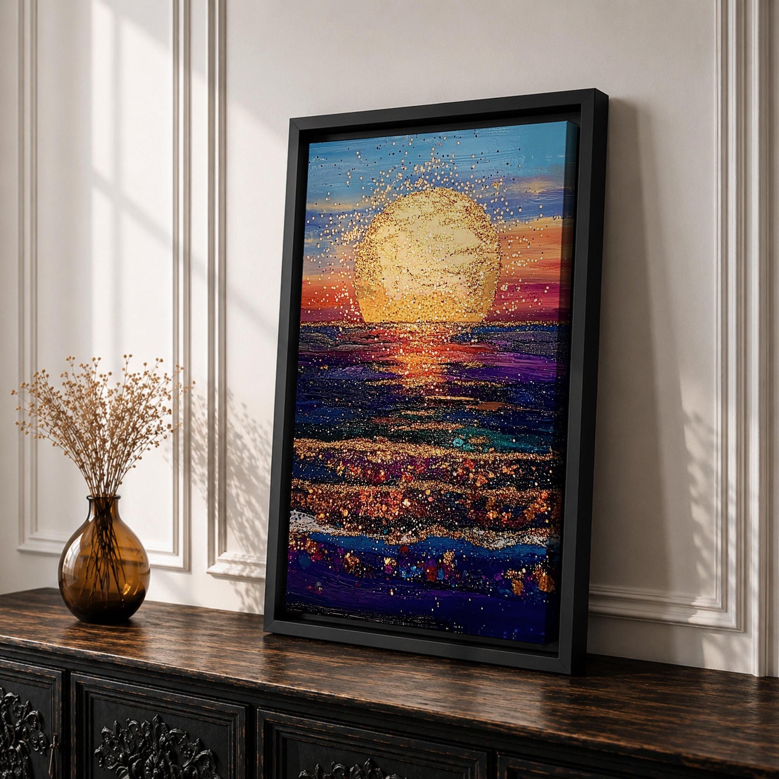A vibrant painting of a large golden sun setting over a textured ocean horizon, featuring shimmering reflections on the water and a colorful sky blending blues, purples, and warm sunset tones. The artwork captures a peaceful coastal landscape with a focus on light and natural beauty.