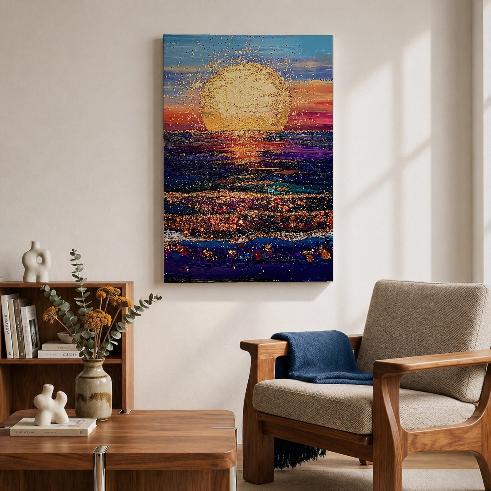 A vibrant painting of a large golden sun setting over a textured ocean horizon, featuring shimmering reflections on the water and a colorful sky blending blues, purples, and warm sunset tones. The artwork captures a peaceful coastal landscape with a focus on light and natural beauty.