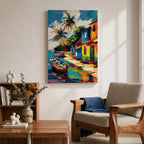 A vibrant painting of a Caribbean village featuring colorful houses along a waterfront with two boats docked near the shore and tall palm trees under a bright sky. The style is bold and lively with strong brushstrokes and vivid colors, capturing a tropical coastal landscape scene.