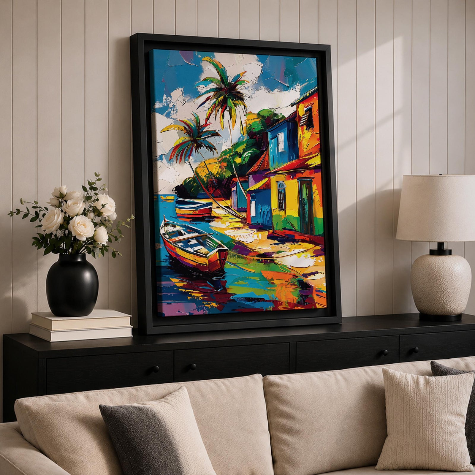 A vibrant painting of a Caribbean village featuring colorful houses along a waterfront with two boats docked near the shore and tall palm trees under a bright sky. The style is bold and lively with strong brushstrokes and vivid colors, capturing a tropical coastal landscape scene.