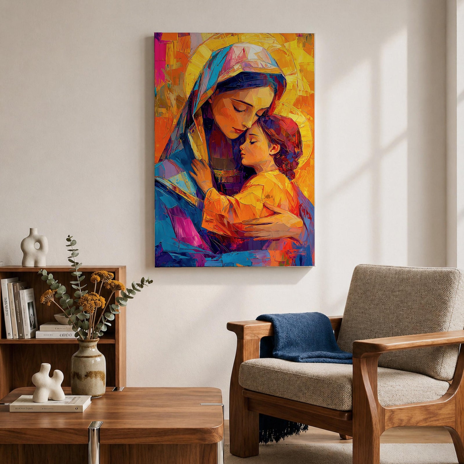 Vibrant mosaic style painting of Mary and Child showing the Virgin Mary gently embracing baby Jesus with both surrounded by glowing golden halos, rendered with bold geometric brushstrokes in bright blues, oranges, reds, and yellows forming a colorful devotional Christian portrait.