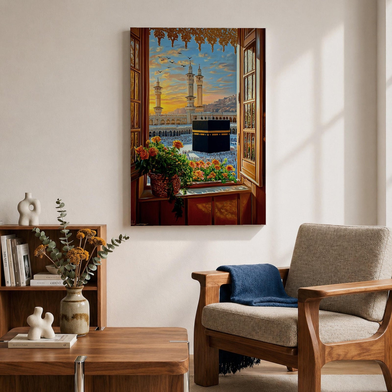 Painting of the Kaaba at Masjid Al Haram in Mecca viewed through an open wooden window with flowers on the sill, showing the black Kaaba in the courtyard surrounded by worshippers and tall mosque minarets under a glowing sunset sky.