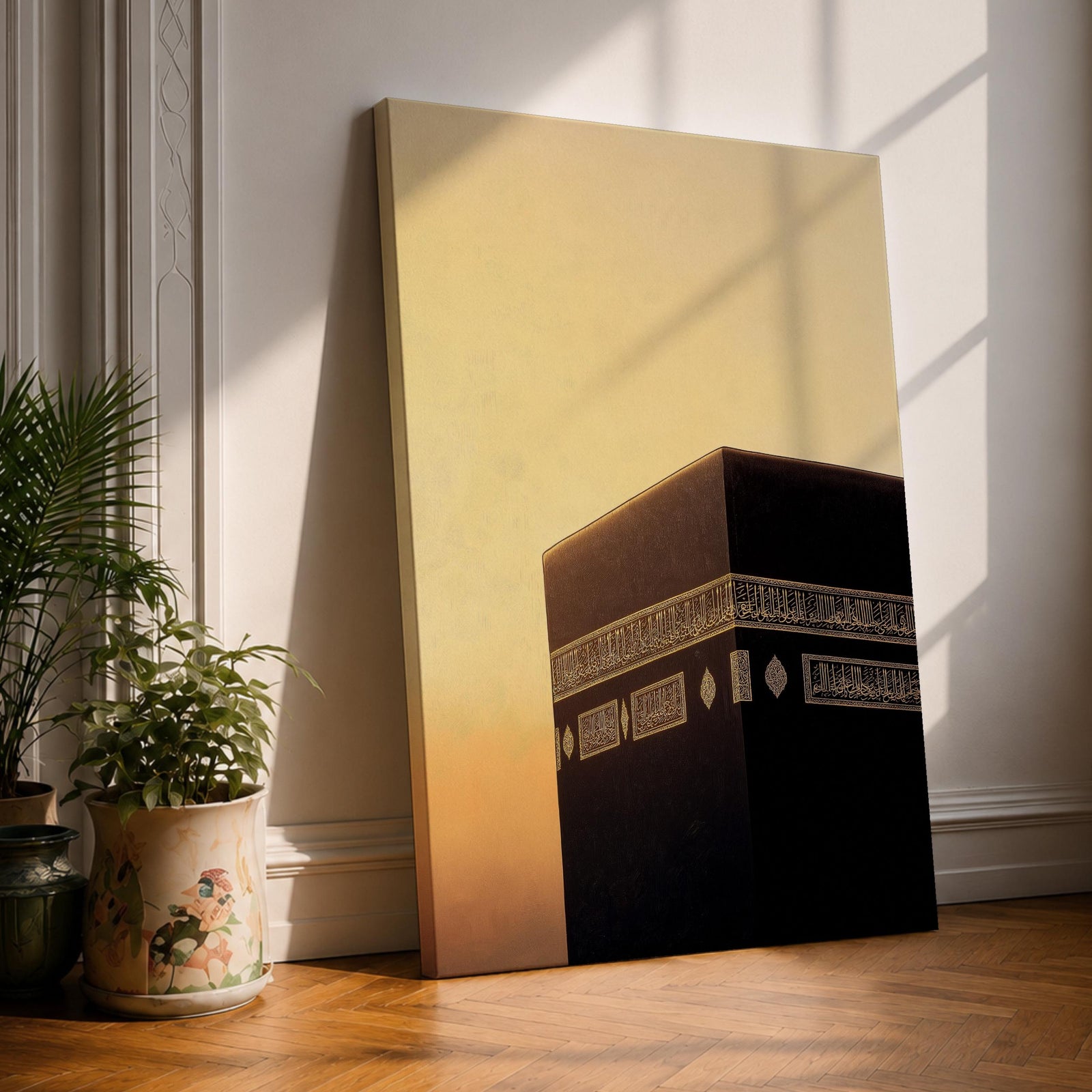 Minimalist artwork of the Kaaba at Masjid Al Haram in Mecca showing the black cubic shrine with gold calligraphy bands against a dramatic golden sunset sky and soft clouds.