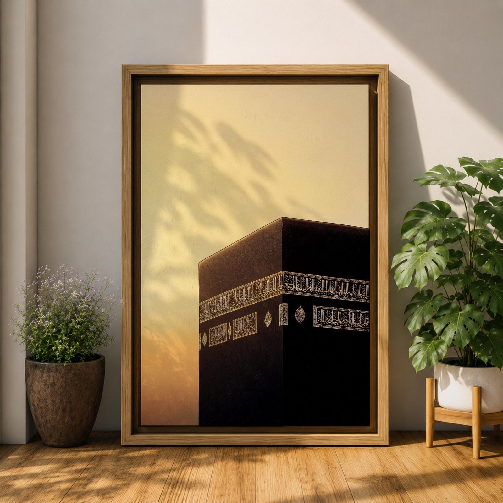 Minimalist artwork of the Kaaba at Masjid Al Haram in Mecca showing the black cubic shrine with gold calligraphy bands against a dramatic golden sunset sky and soft clouds.