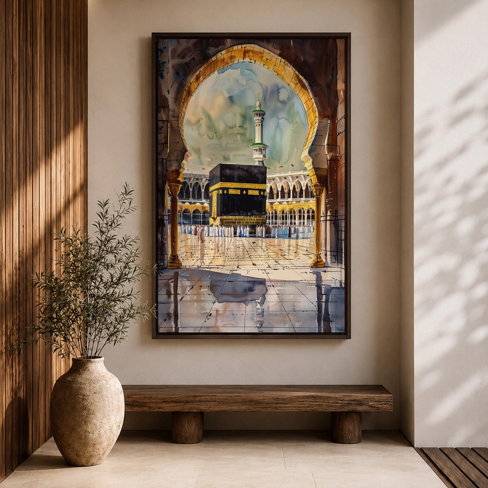 Watercolor-style painting of the Kaaba at Masjid Al Haram in Mecca viewed through a large mosque archway, with pilgrims standing in the courtyard and a tall minaret rising behind the sacred shrine.