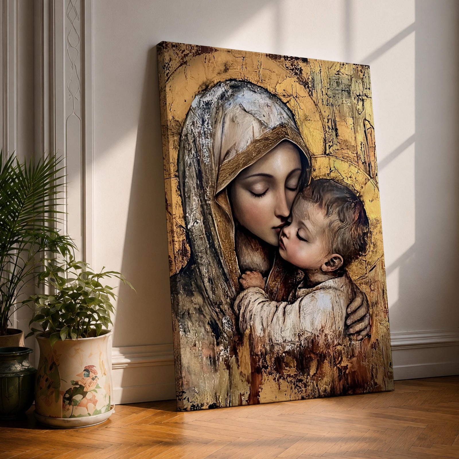 Vintage devotional artwork of the Virgin Mary gently kissing baby Jesus while embracing him, both surrounded by soft golden halos and warm aged textures resembling classical Catholic icon painting.