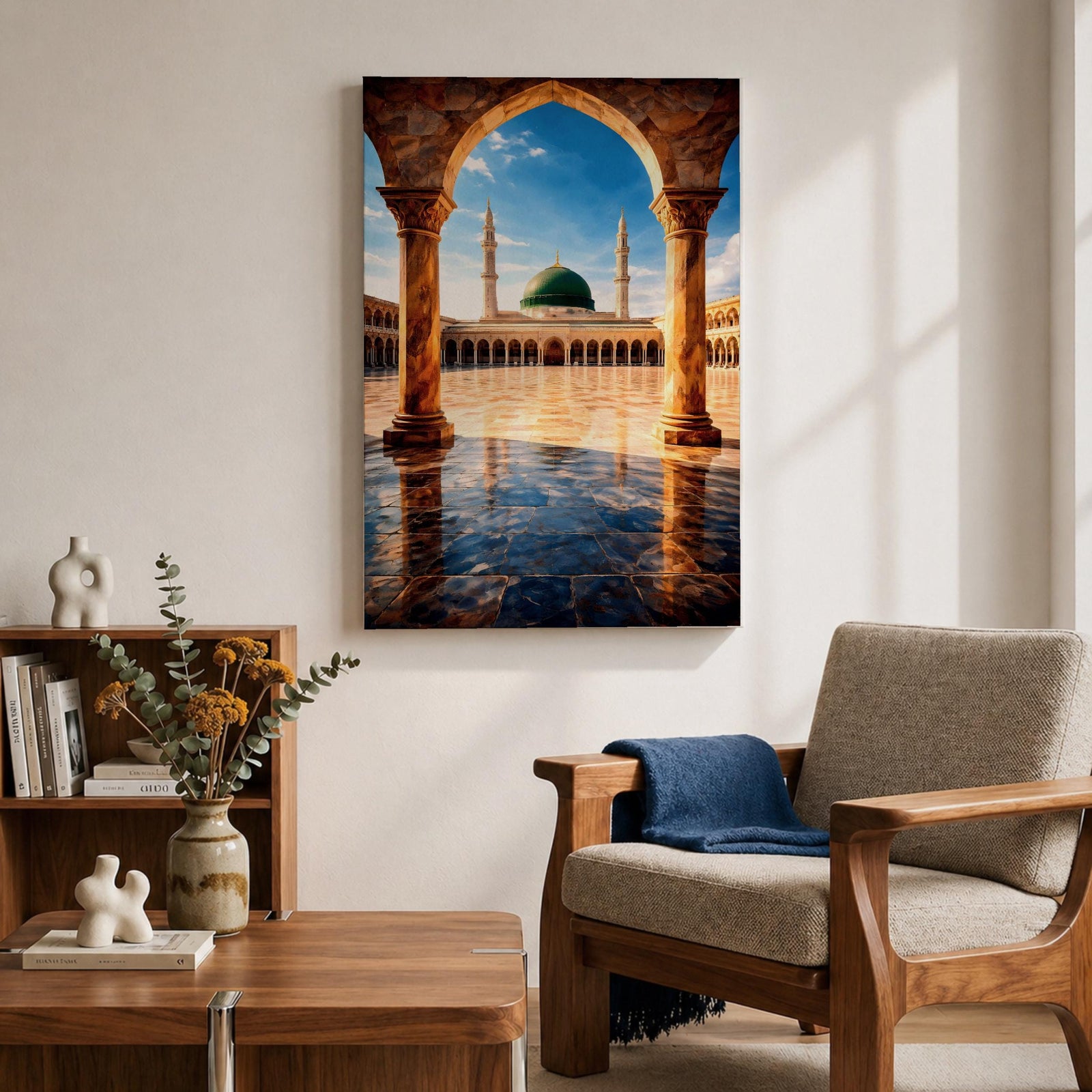 Artwork of Masjid Al Nabawi in Medina showing the iconic green dome and tall minarets framed through a large stone archway with a reflective marble courtyard under a bright blue sky.