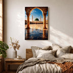 Artwork of Masjid Al Nabawi in Medina showing the iconic green dome and tall minarets framed through a large stone archway with a reflective marble courtyard under a bright blue sky.