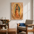 Painting of Our Lady of Guadalupe standing in a prayer pose with hands clasped and head bowed, wearing a flowing rose colored gown and a blue mantle decorated with stars, surrounded by radiant golden rays forming an oval halo, standing on a crescent moon supported by a small angel in traditional Catholic devotional style.
