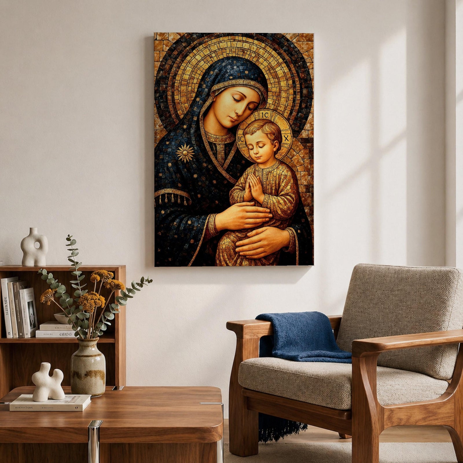 Byzantine style mosaic painting of the Virgin Mary holding the child Jesus, both with heads gently inclined and halos behind them, the child shown with hands clasped in prayer while Mary supports him, rendered with golden mosaic tiles and rich dark blue garments in a traditional Christian icon composition.