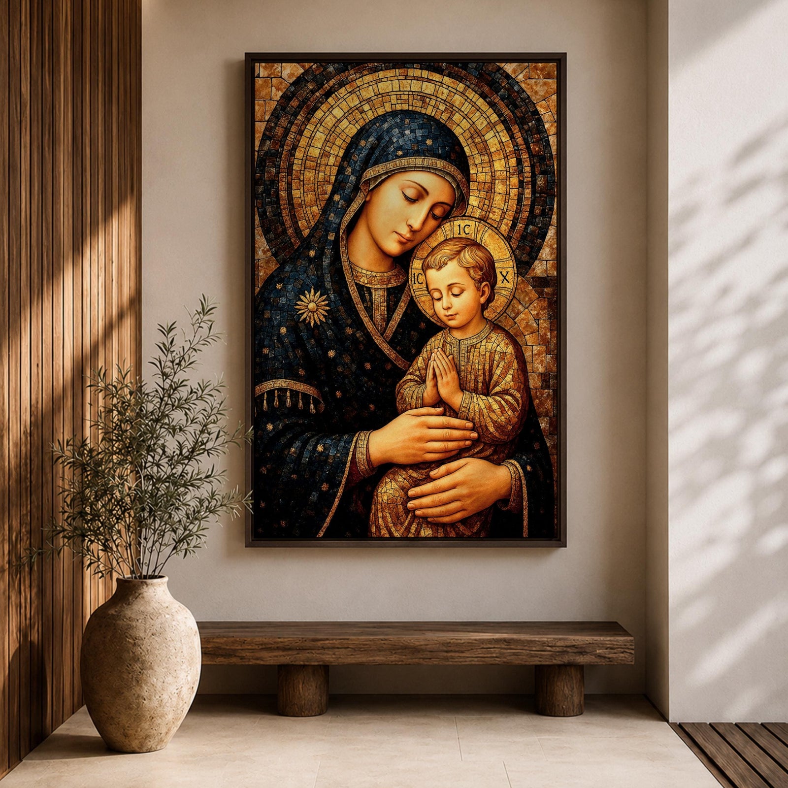 Byzantine style mosaic painting of the Virgin Mary holding the child Jesus, both with heads gently inclined and halos behind them, the child shown with hands clasped in prayer while Mary supports him, rendered with golden mosaic tiles and rich dark blue garments in a traditional Christian icon composition.