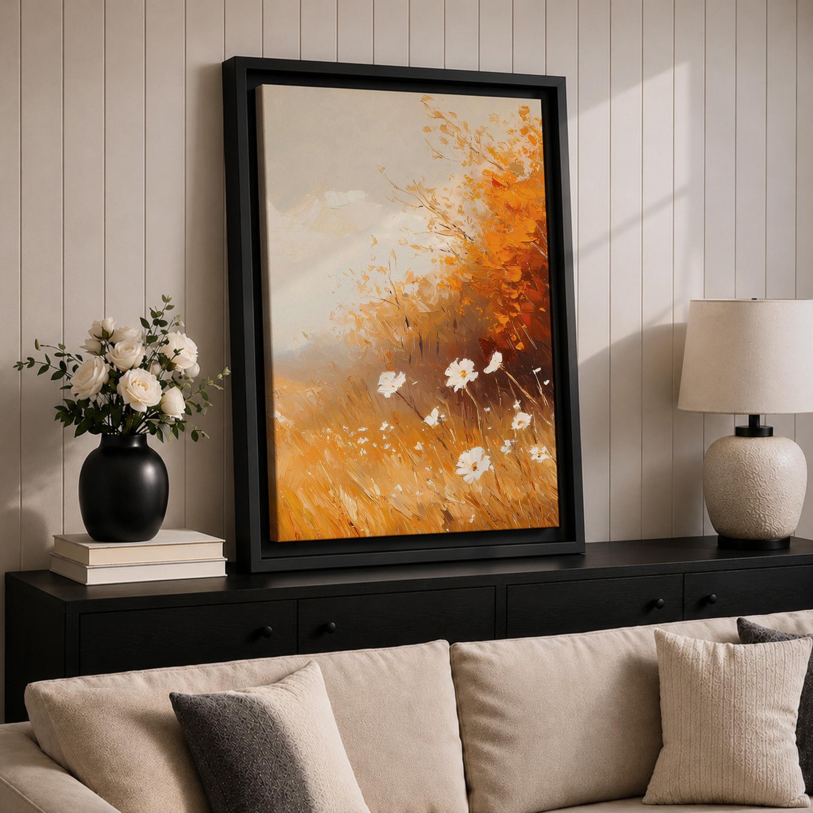 A vintage-style framed canvas depicting autumn wildflowers with white petals and golden foliage in an impressionistic, rustic floral composition. The artwork features textured brushstrokes and warm tones evoking a cozy cottagecore aesthetic.