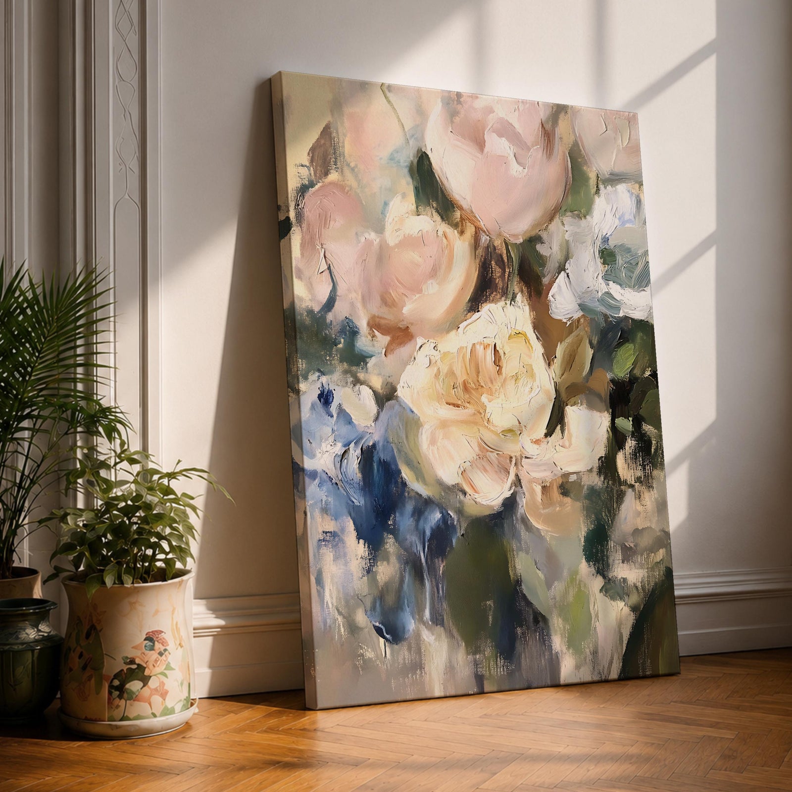 An abstract floral painting featuring loosely blended flowers including roses and other blooms in soft pastel tones with visible brushstrokes, rendered in an impressionistic style on a framed canvas.