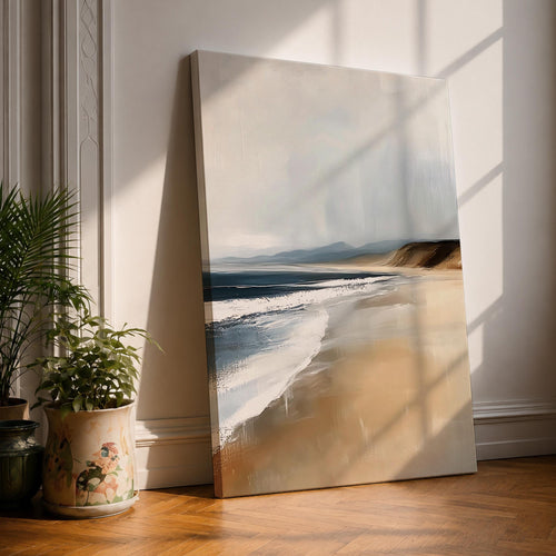 A vintage style framed canvas wall art depicting a serene coastal landscape with gentle waves meeting a sandy beach under a cloudy sky. The artwork captures the natural beauty of the shoreline with soft, muted tones and a nostalgic, timeless aesthetic.