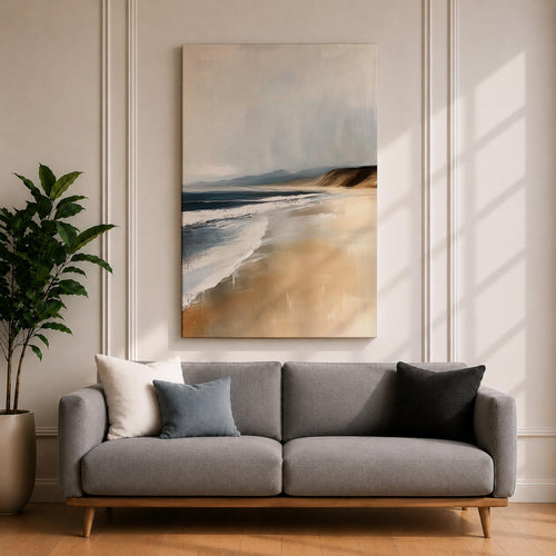 A vintage style framed canvas wall art depicting a serene coastal landscape with gentle waves meeting a sandy beach under a cloudy sky. The artwork captures the natural beauty of the shoreline with soft, muted tones and a nostalgic, timeless aesthetic.