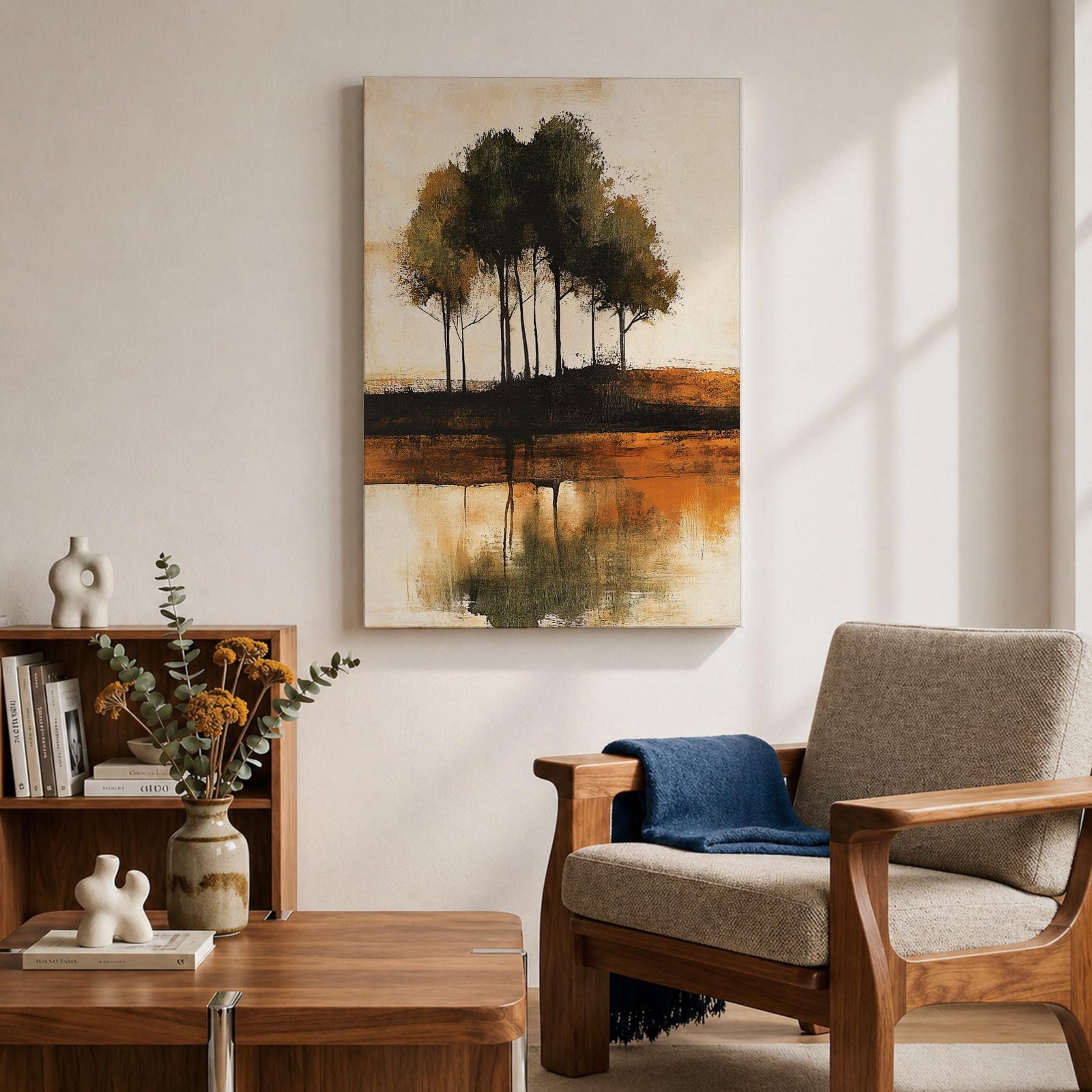 This artwork features an abstract landscape with a cluster of trees reflected in a body of water. The style is painterly and textured with earthy tones, emphasizing natural forms and rustic elements. The composition centers on the trees and their mirrored image, creating a serene nature scene.