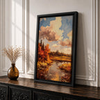 A framed impasto style painting depicting an autumn landscape with a river flowing through vibrant fall foliage and trees under a partly cloudy sky, rendered with textured brushstrokes emphasizing the rustic natural scene.